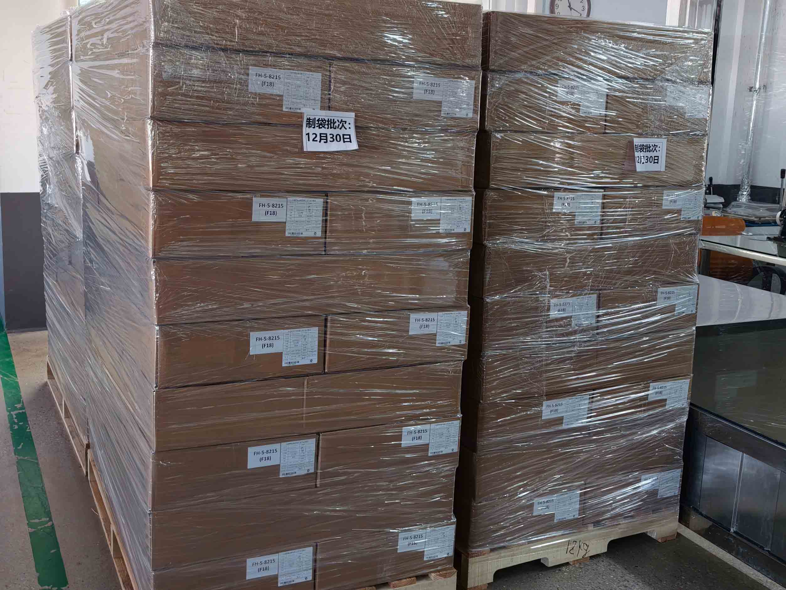 Genuine pallet-staging context for boxed coffee pouches