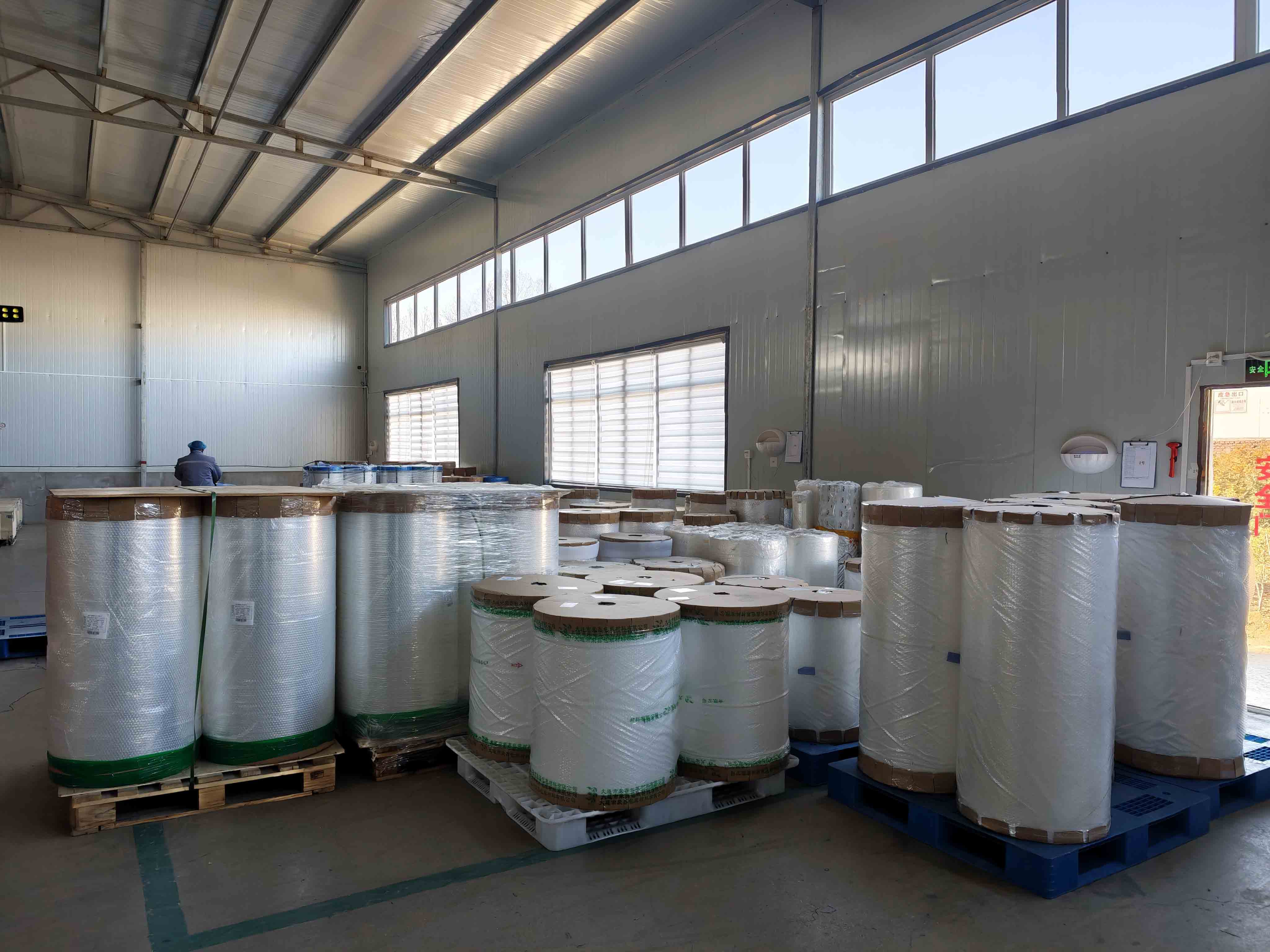 Real film rolls stored at the Mylarbag packaging factory before pouch conversion.