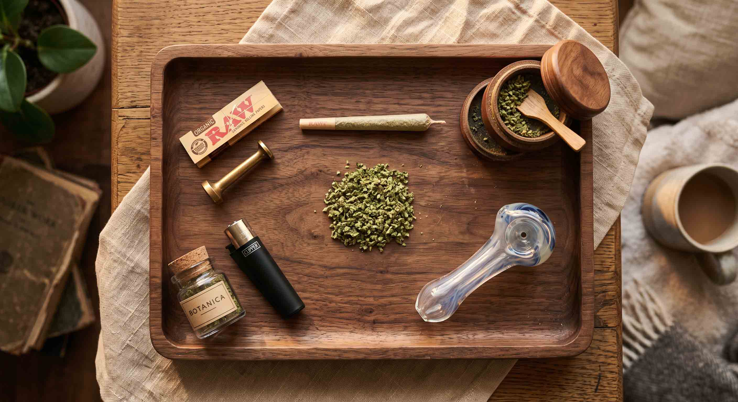 A 1-gram dime bag of weed broken down to show it can fill one standard joint or three glass pipes.