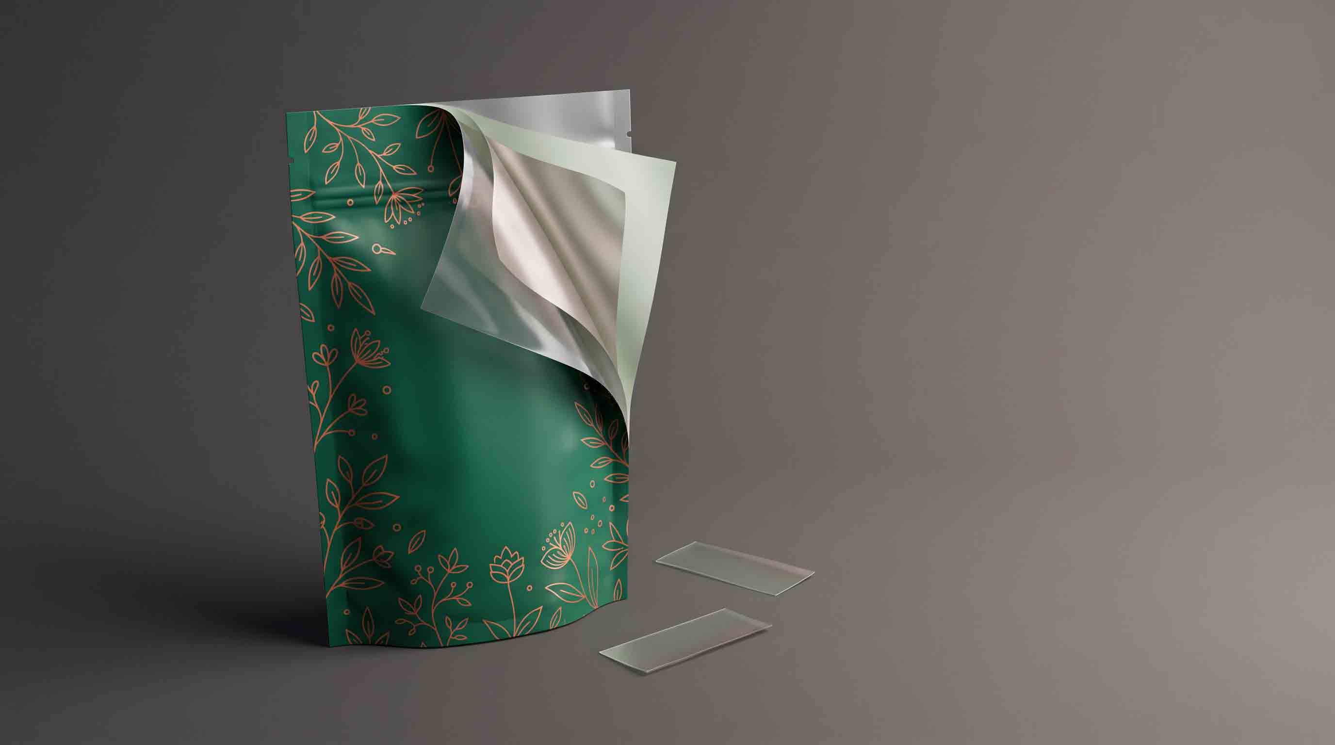 An unbranded flexible pouch with a visual cutaway showing separate outer, middle, and sealant-side film layers.