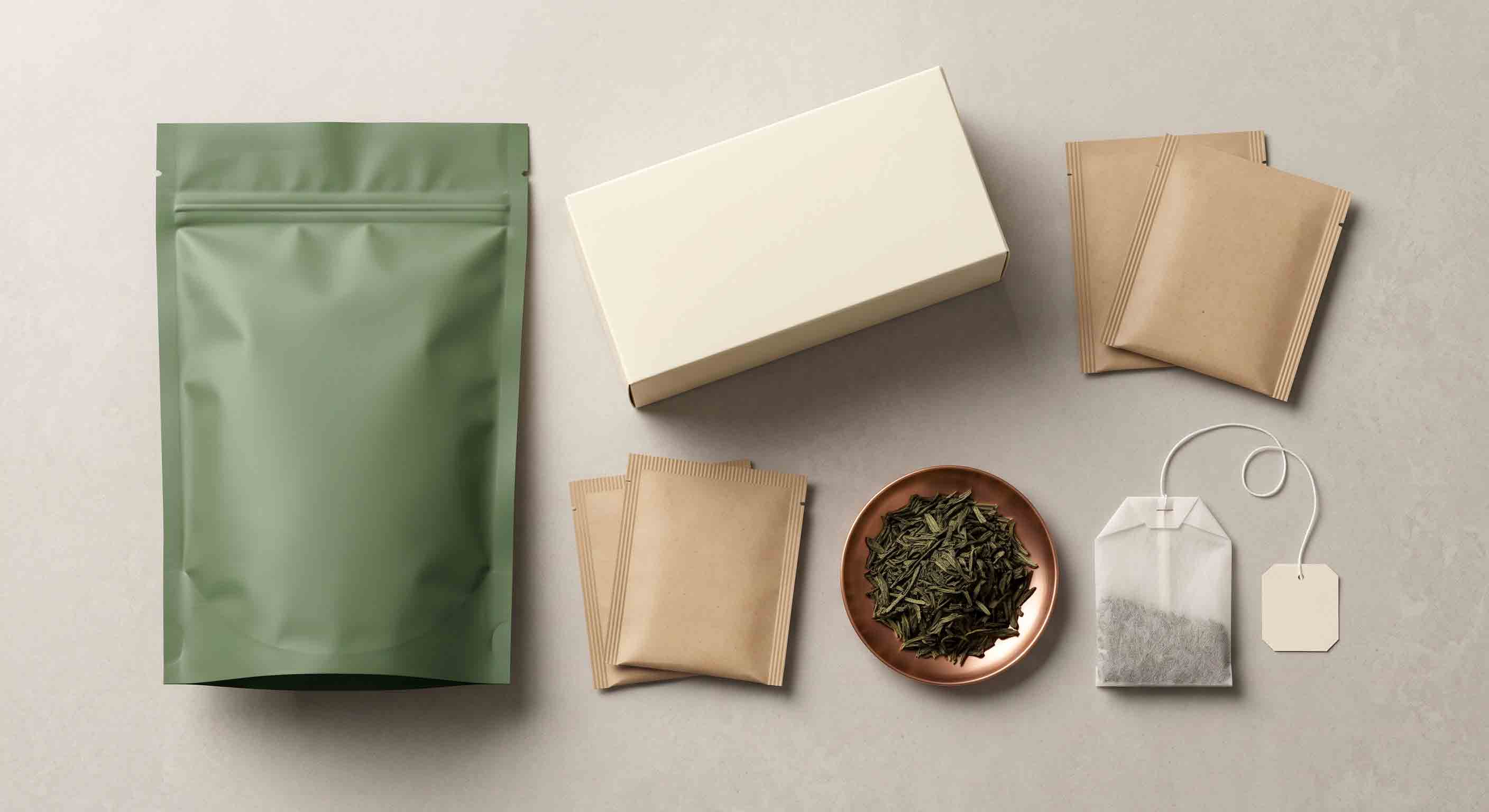 Article summary visual of multiple unbranded tea packaging types.